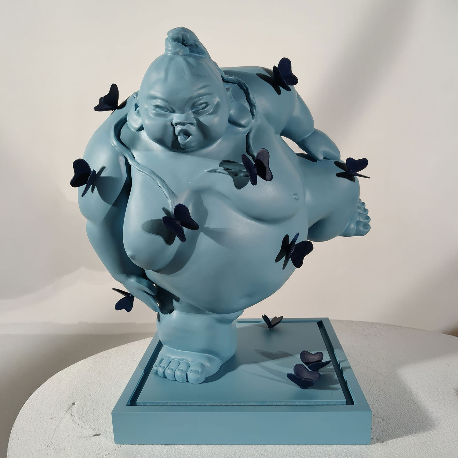 Chi dorme non piglia pesci. Sumo sculpture by Monica Foglia Art Creator